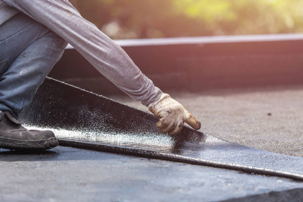 Professional Waterproofing technician working in Oshkosh, WI